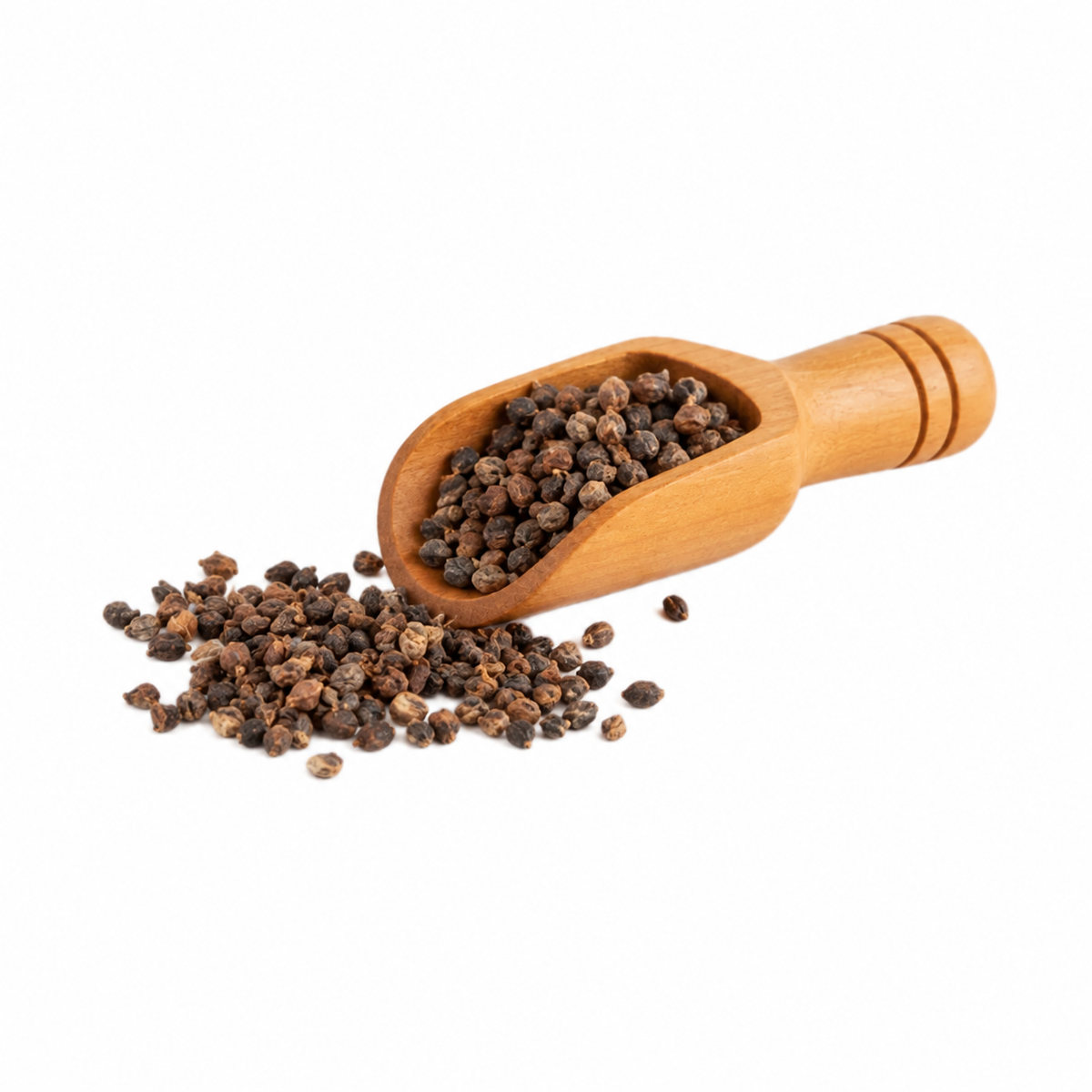 Semillas peladas de cardamomo en cucharita de madera – presentación de 50 g