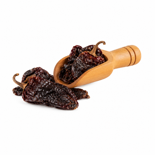 Chile ancho entero en cucharita de madera – presentación de 50 g