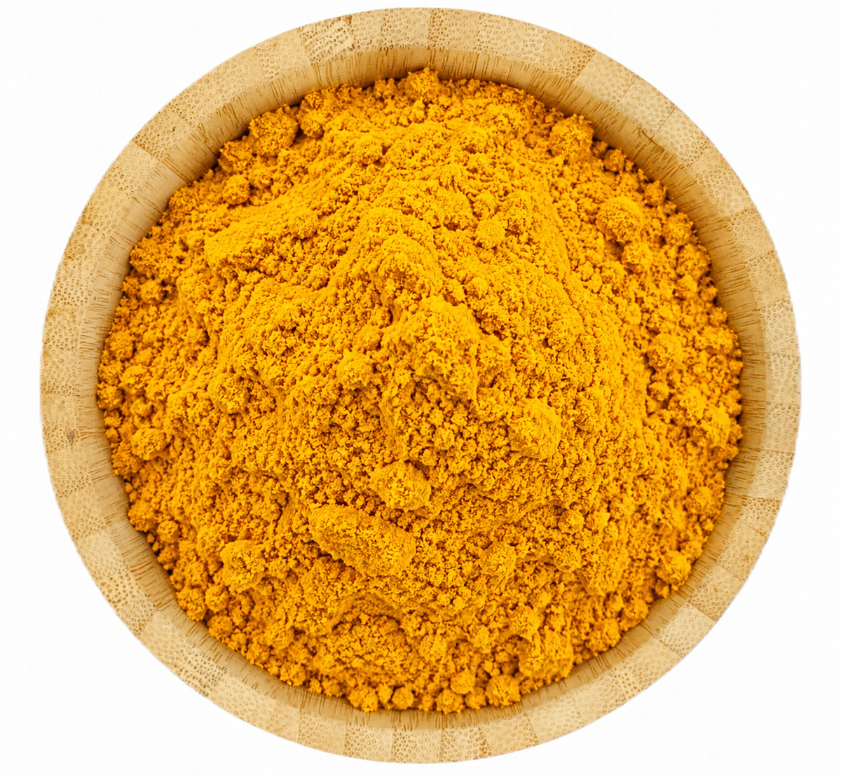 Cúrcuma en polvo en tazón de bambú