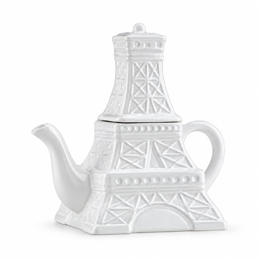 Juego de té de cerámica blanca con diseño de Torre Eiffel, presentado apilado.