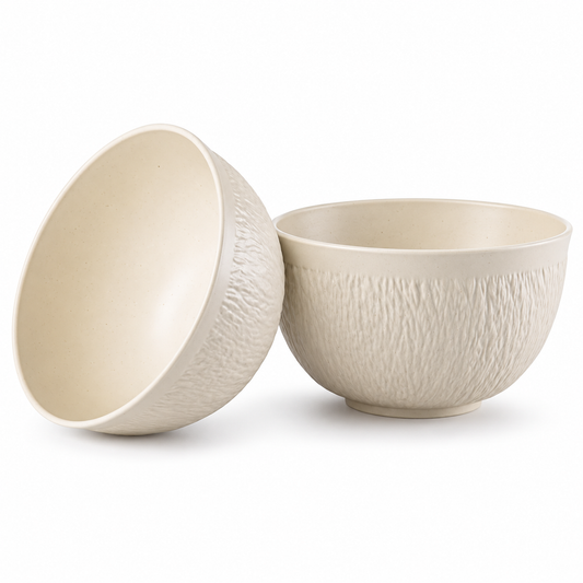 Set de dos mini cuencos Threshold color crema, con exterior texturizado e interior liso, sobre fondo blanco.